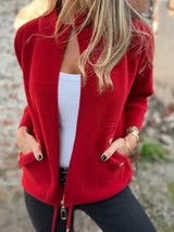 Women's red textured knit zip-up outerwear jacket with decorative button pockets, lightweight fall jacket available in sizes Small–5XL, styled over a white tank and black jeans.