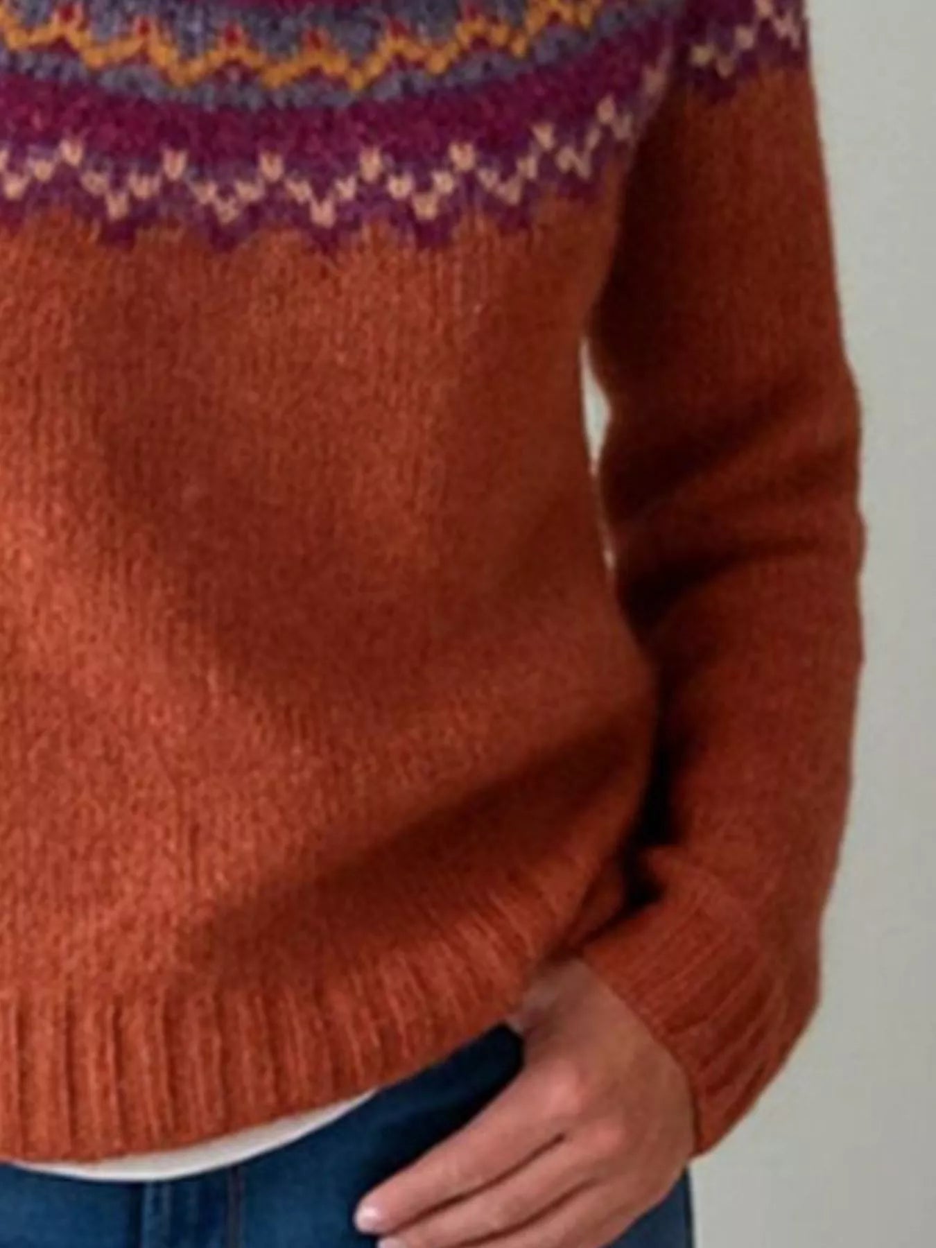 Women’s vintage patterned round neck sweater in rust with multicolor yoke design, available in sizes Small through 5XL.