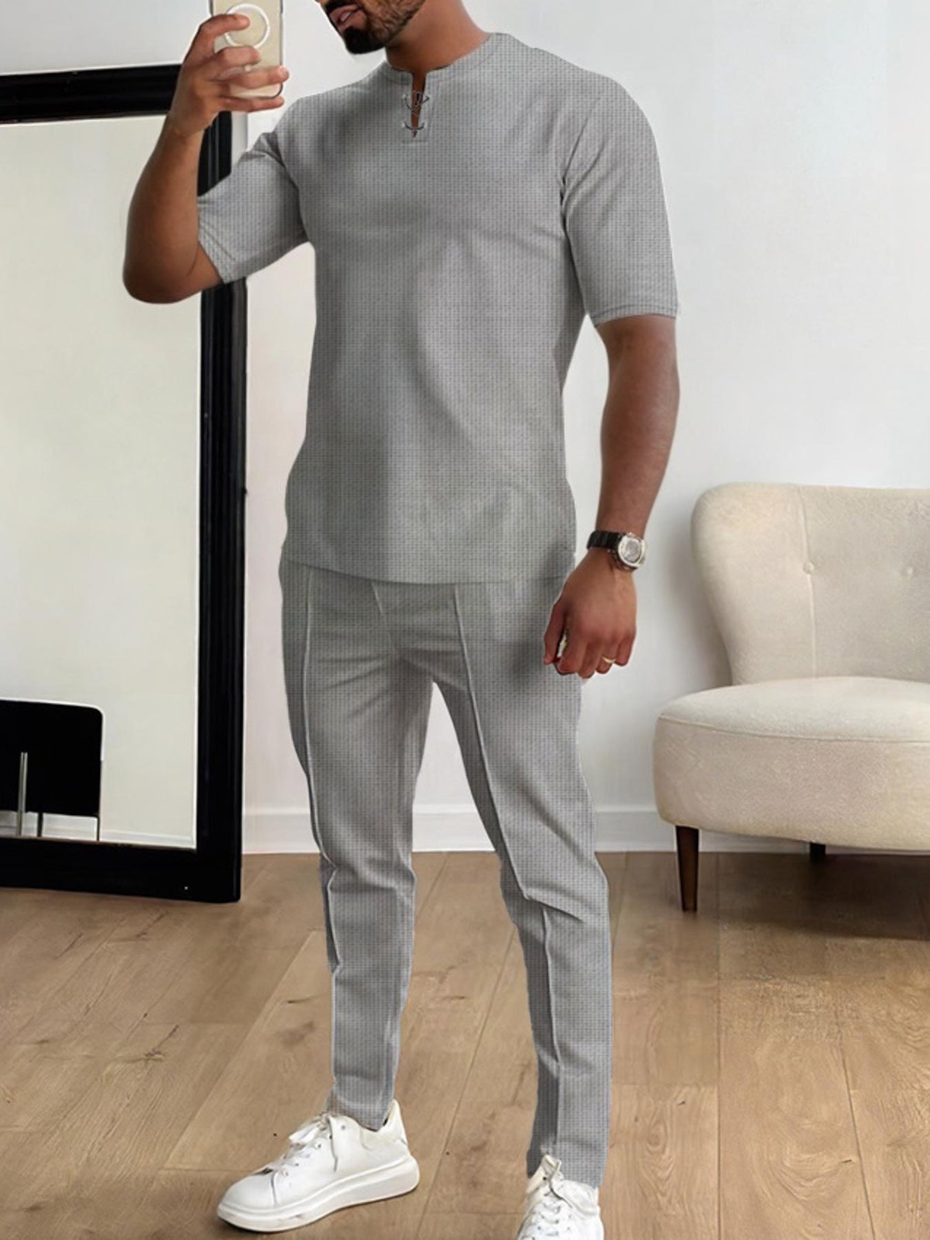 Men's gray short-sleeve top and matching pants two-piece casual set with white sneakers, available in sizes Small–3XL.