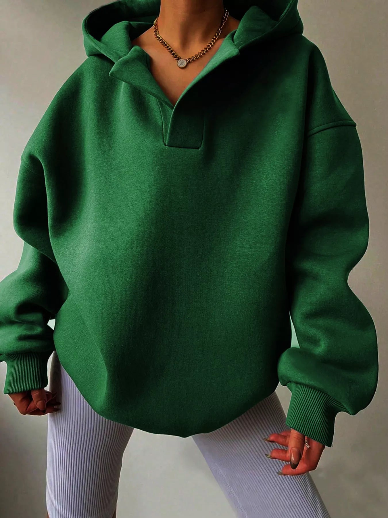 Women's oversized dropped shoulder hoodie sweatshirt in green with long sleeves and relaxed fit, perfect for casual fall outfits, available in 11 colors and sizes Small–2XL.
