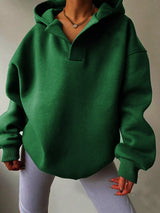 Women's oversized dropped shoulder hoodie sweatshirt in green with long sleeves and relaxed fit, perfect for casual fall outfits, available in 11 colors and sizes Small–2XL.