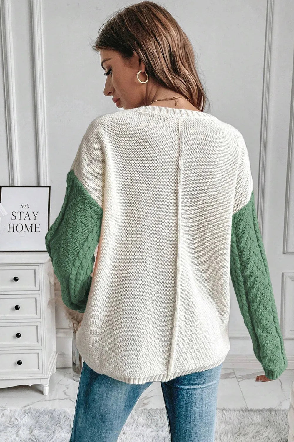 Double Take women’s gum leaf color block cable-knit drop shoulder sweater with front pocket and long sleeves.
