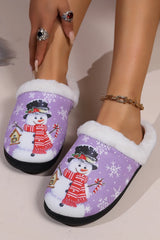Heliotrope purple snowman slippers with white faux fur lining, festive snowflakes, smiling snowman print, and round toe design.