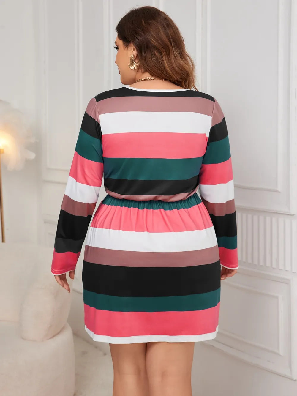 Women's plus size striped V-neck long sleeve mini dress with adjustable drawstring waist in pink, green, black, taupe, and white, available in sizes 1XL–4XL.
