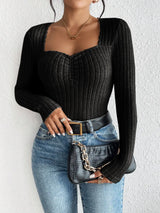 Woman wearing the Honey Ribbed Long Sleeve Sweetheart Neck Top in black with light wash jeans and a black belt, stylish ribbed women's top from Chic Mystik Boutique.