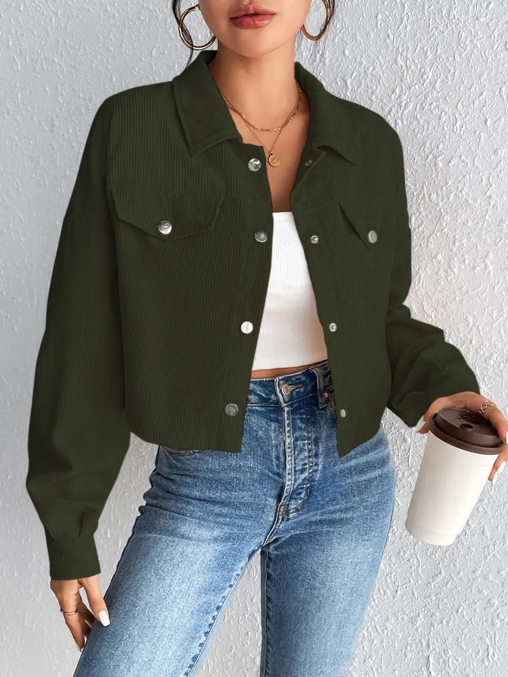 Woman wearing the Honey Snap Down Long Sleeve Jacket in army green with blue jeans and a white top, lightweight women's fall jacket from Chic Mystik Boutique.