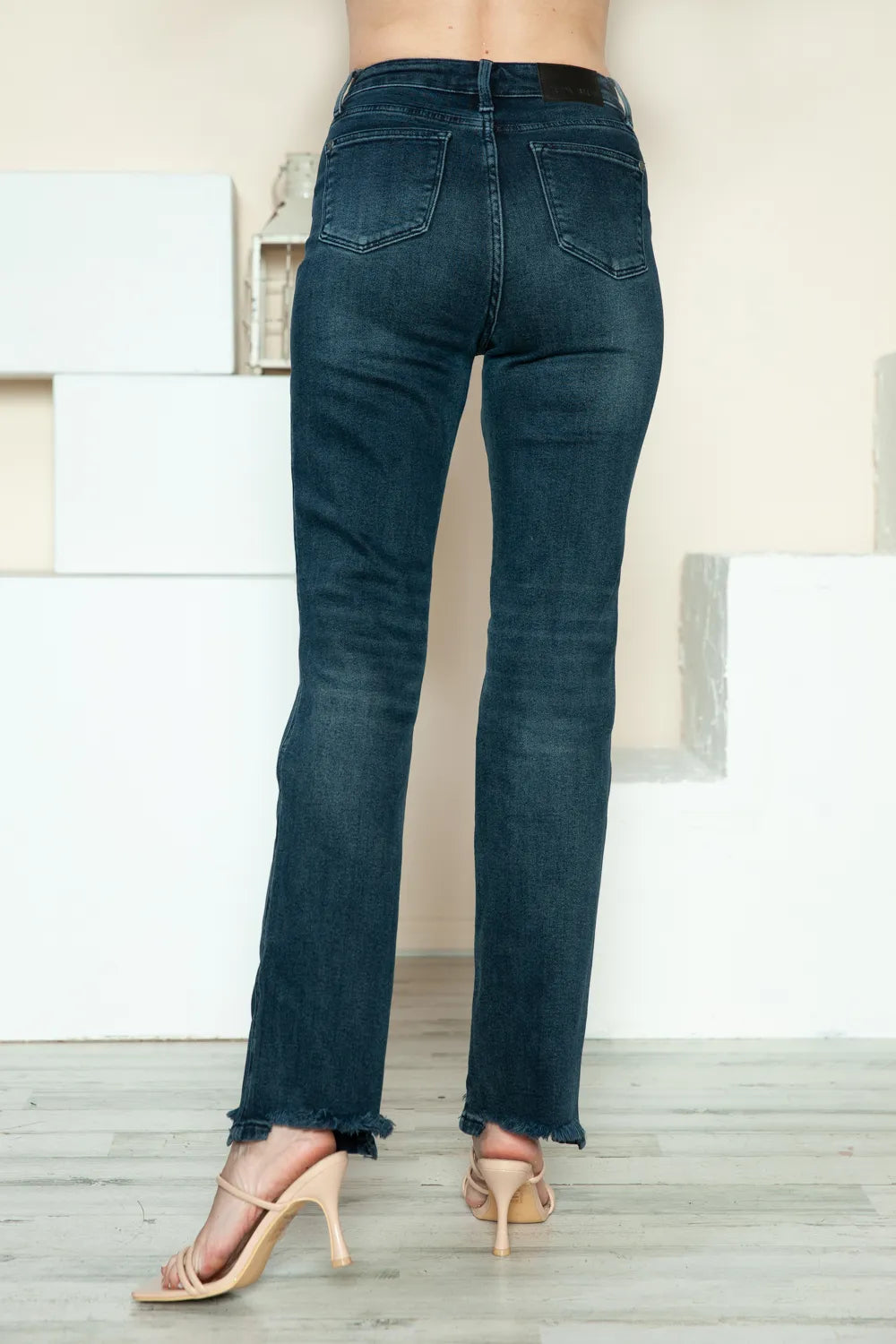 Judy Blue Full-Size Button Fly Hem Destroy Straight Jeans in medium wash featuring a button fly closure, straight-leg fit, distressed raw hem, classic five-pocket styling, and moderate stretch denim.