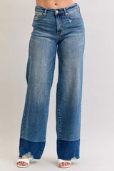 Judy Blue Raw Hem High Waist Column Straight Jeans in medium wash featuring a flattering high-rise fit, wide column straight-leg silhouette, raw hem detailing, and classic five-pocket styling for everyday wear.