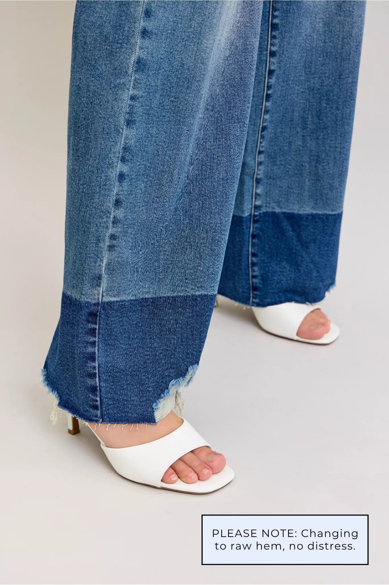 Judy Blue Raw Hem High Waist Column Straight Jeans in medium wash featuring a flattering high-rise fit, wide column straight-leg silhouette, raw hem detailing, and classic five-pocket styling for everyday wear.