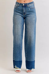 Judy Blue Raw Hem High Waist Column Straight Jeans in medium wash featuring a flattering high-rise fit, wide column straight-leg silhouette, raw hem detailing, and classic five-pocket styling for everyday wear.