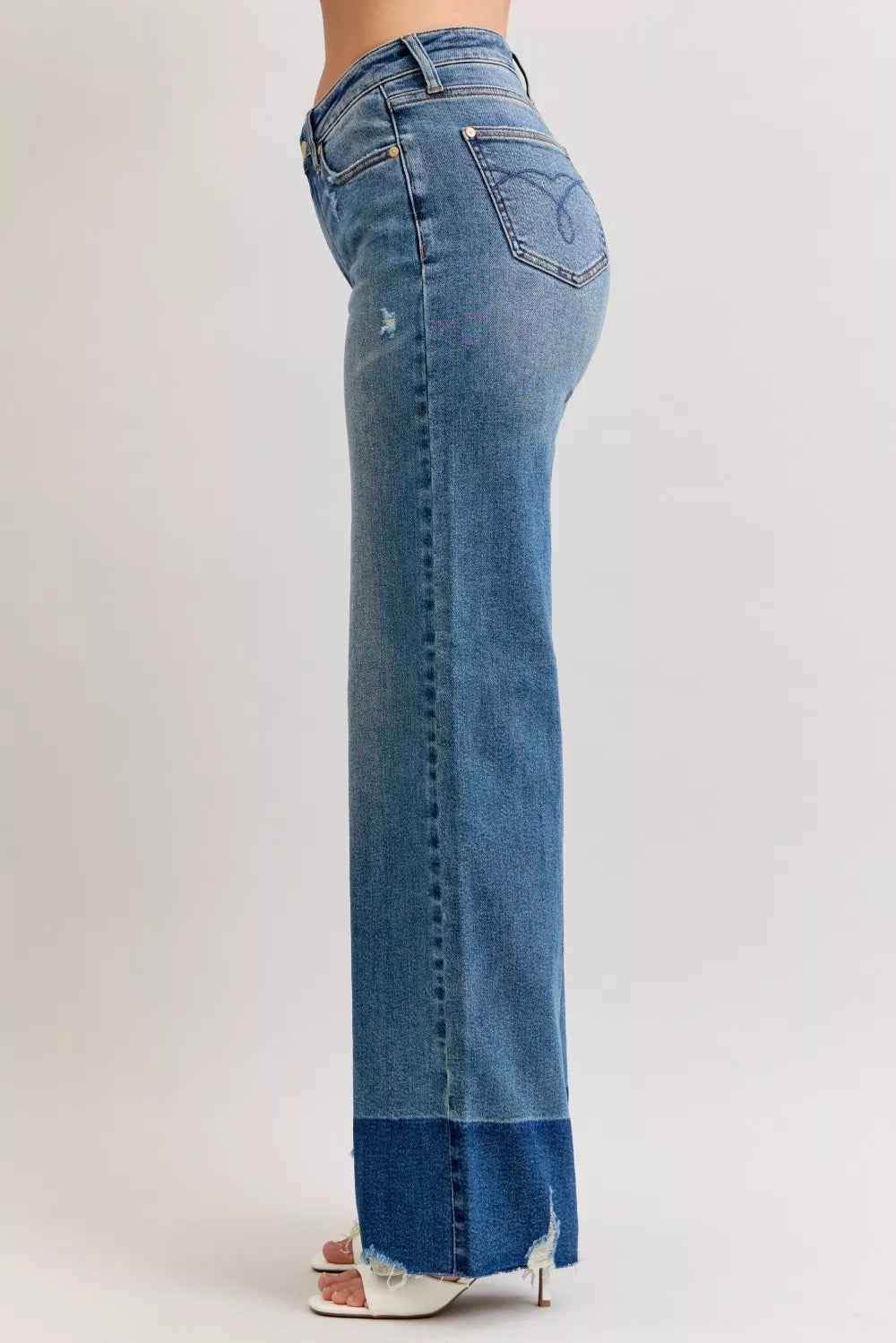 Judy Blue Raw Hem High Waist Column Straight Jeans in medium wash featuring a flattering high-rise fit, wide column straight-leg silhouette, raw hem detailing, and classic five-pocket styling for everyday wear.