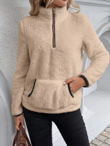 Cozy up in this full-size fleece quarter zip sweatshirt with pockets. Slightly stretchy and available in 11 colors and sizes Small–3XL for easy everyday style.