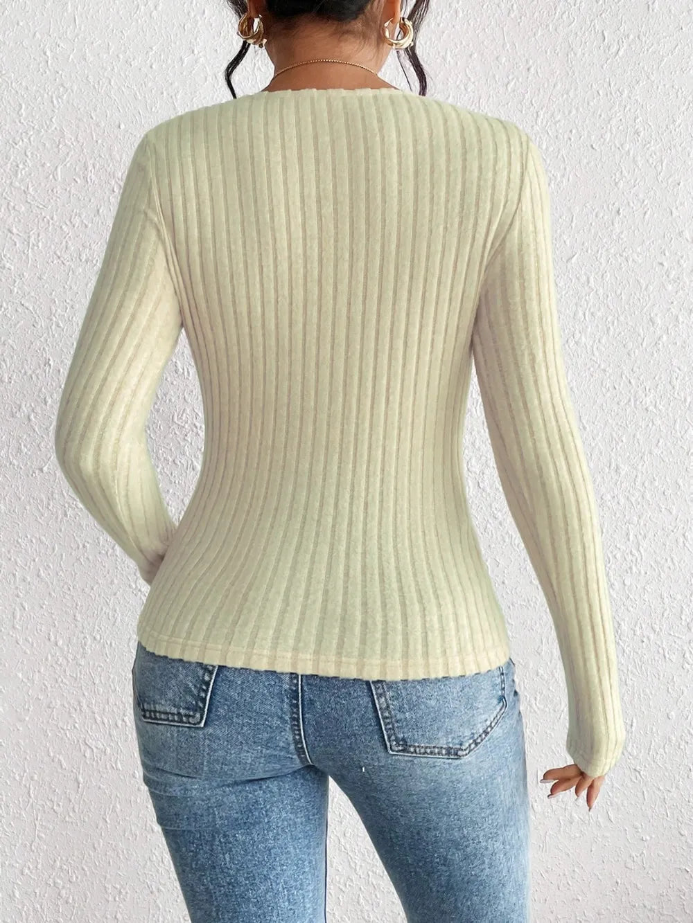 Woman wearing the Honey Ribbed Long Sleeve Sweetheart Neck Top in khaki with light wash jeans and a black belt, stylish ribbed women's top from Chic Mystik Boutique.