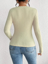 Woman wearing the Honey Ribbed Long Sleeve Sweetheart Neck Top in khaki with light wash jeans and a black belt, stylish ribbed women's top from Chic Mystik Boutique.