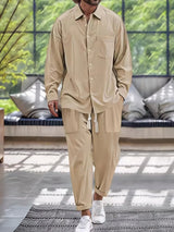 Men’s khaki button down long sleeve shirt and matching pants two-piece set with drawstring waist, available in sizes Small–2XL.