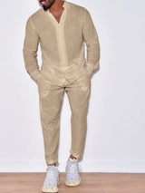 Men’s khaki button up long sleeve top and matching pants two-piece set styled with white sneakers, available in sizes Small–2XL.