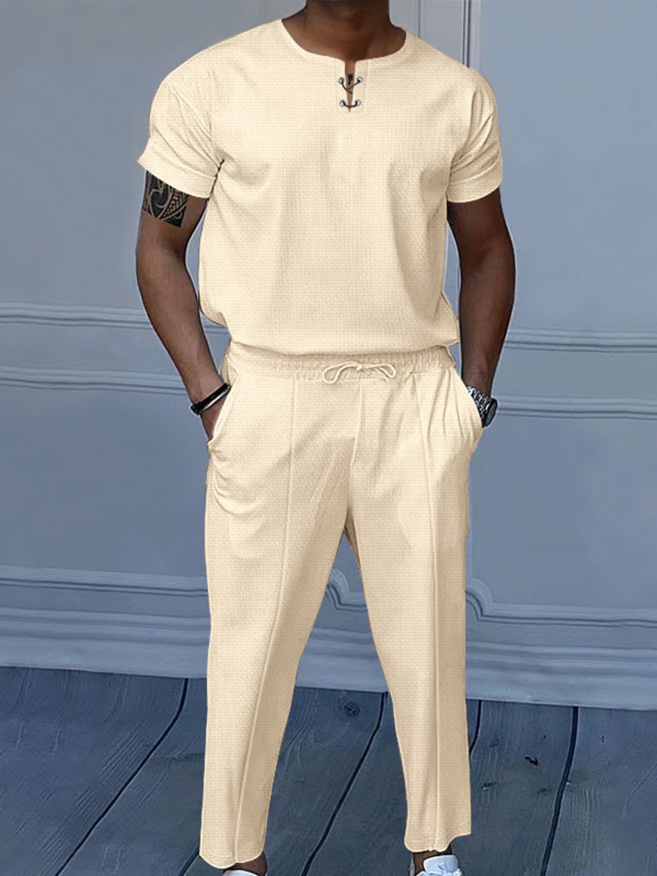 Men's khaki short-sleeve top and matching pants two-piece casual set with white sneakers, available in sizes Small–3XL.