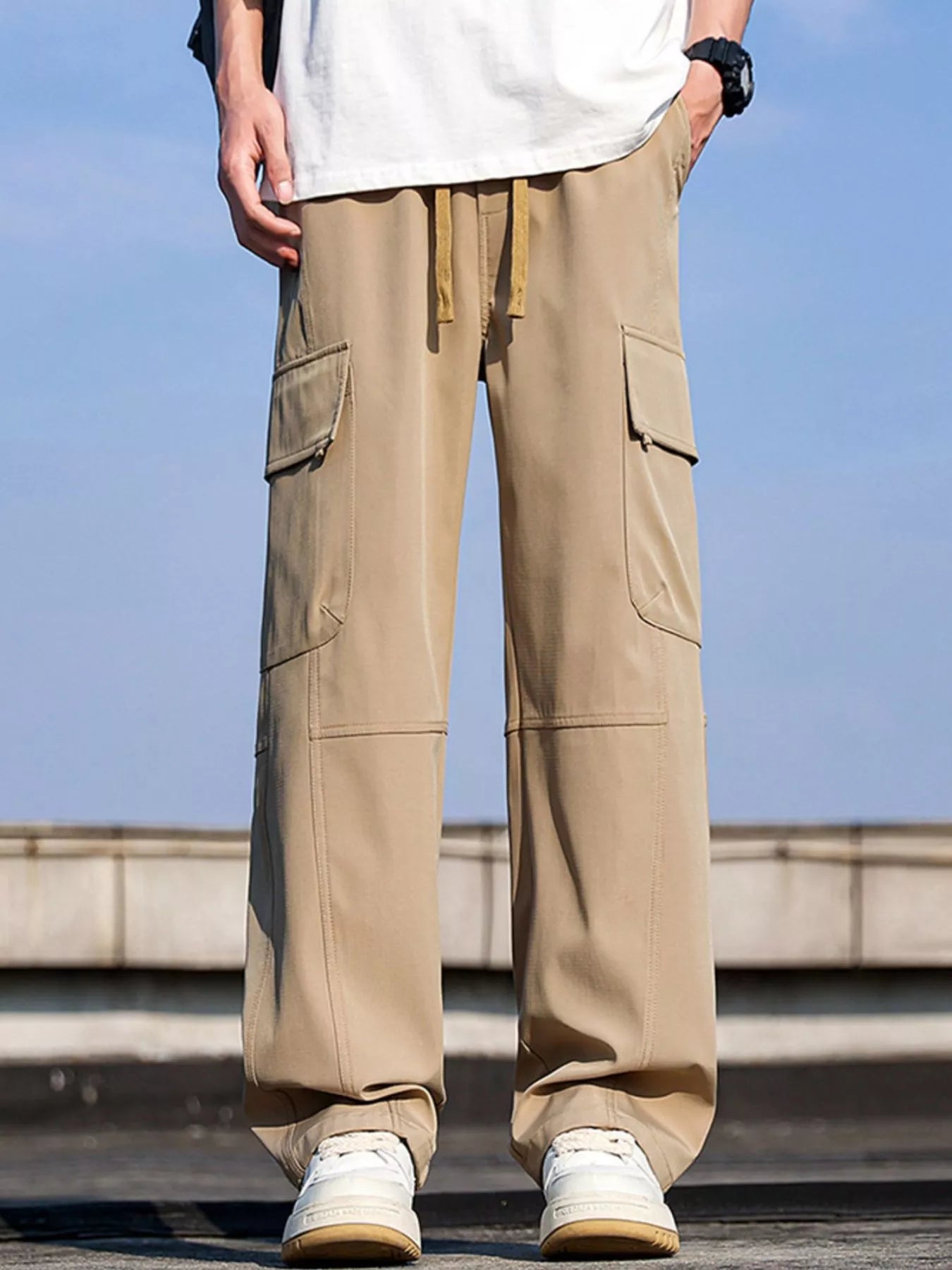 Men’s khaki plus size cargo wide leg pants with drawstring waist and utility pockets, sizes Medium–4XL.