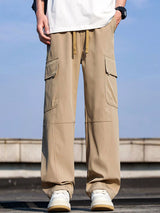Men’s khaki plus size cargo wide leg pants with drawstring waist and utility pockets, sizes Medium–4XL.