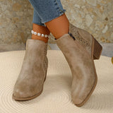 Women’s point toe block heel ankle boots with perforated side detail in khaki.