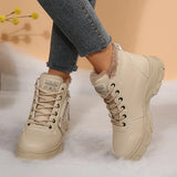 Women’s fleece-lined lace-up combat boots with chunky rubber sole and side detail, available in khaki, black and white.