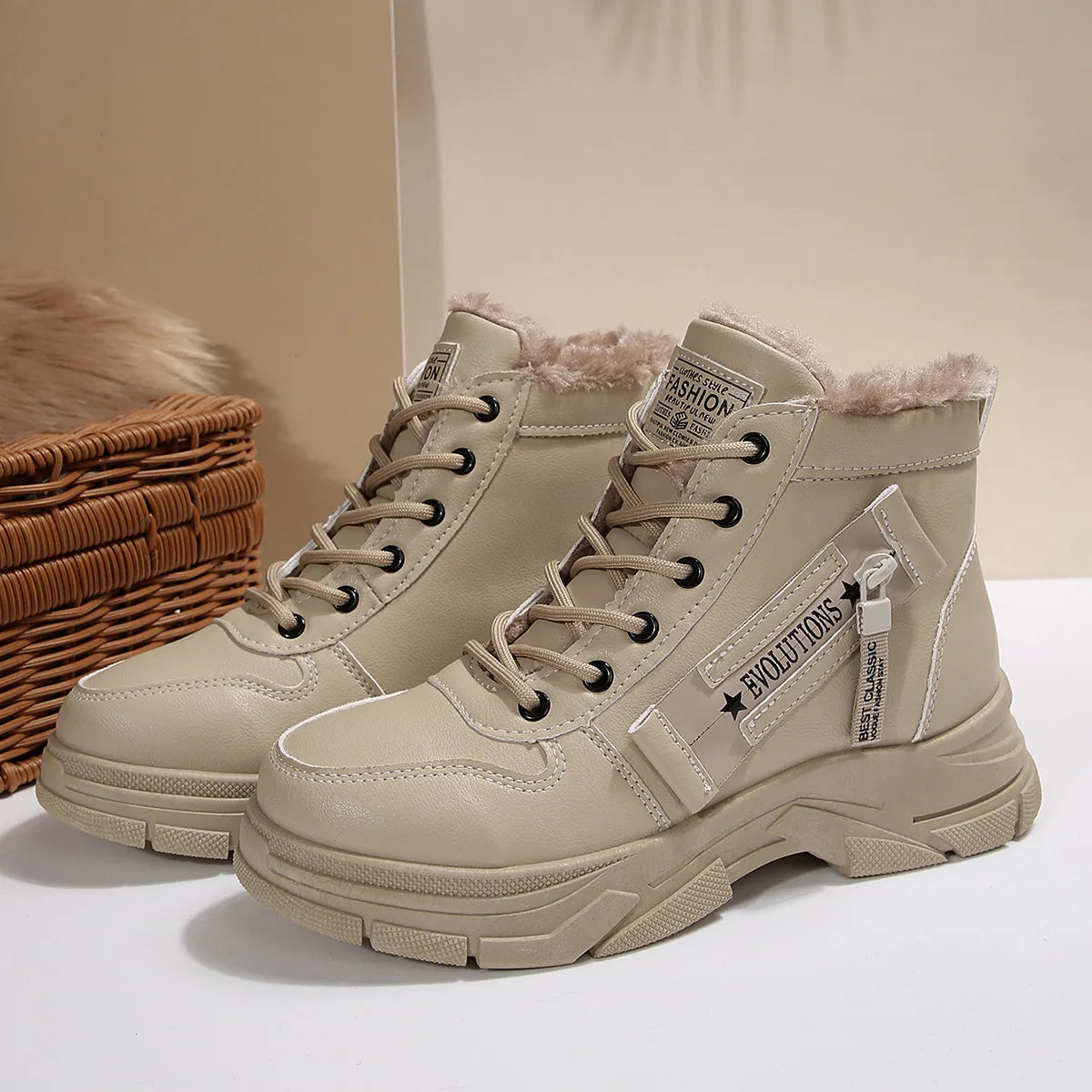 Women’s fleece-lined lace-up combat boots with chunky rubber sole and side detail, available in khaki, black and white.