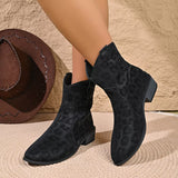 Women's black leopard print western ankle boots with subtle animal print, pointed toes and low block heels.
