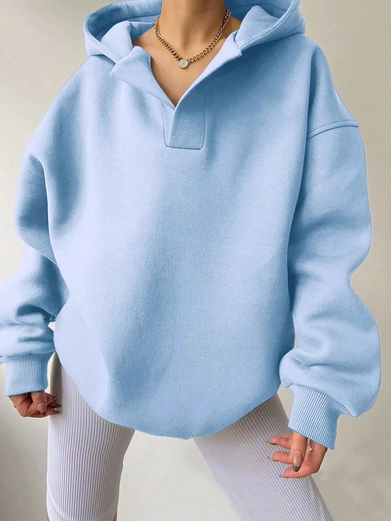 Women's oversized dropped shoulder hoodie sweatshirt in light blue with long sleeves and relaxed fit, perfect for casual fall outfits, available in 11 colors and sizes Small–2XL.
