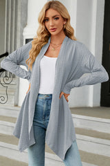 Women's Open Front Long Sleeve Cardigan in light blue layered over a white tank and blue jeans, lightweight long cardigan for fall outfits, available in nine colors at Chic Mystik Boutique.