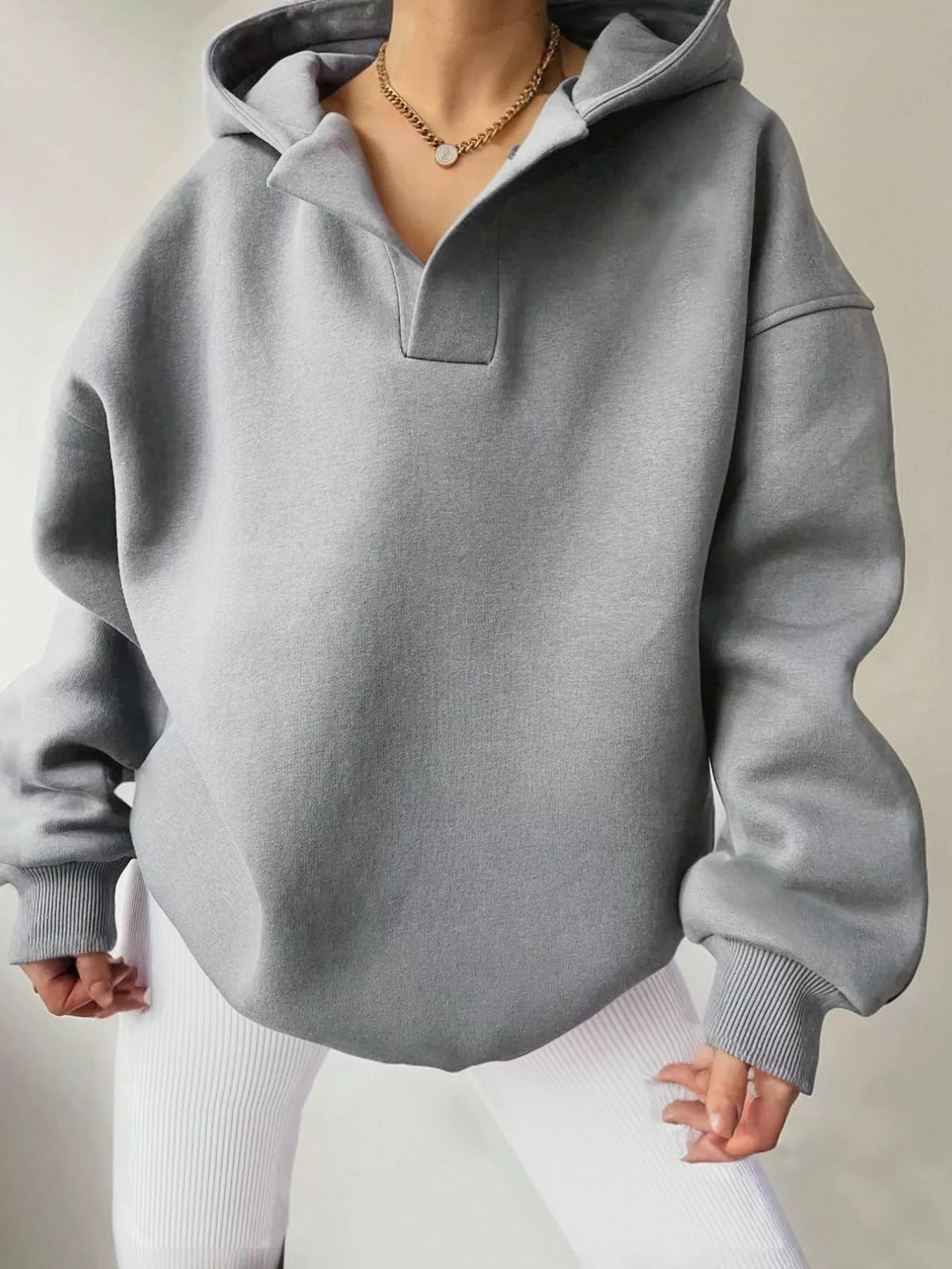 Women's oversized dropped shoulder hoodie sweatshirt in light gray with long sleeves and relaxed fit, perfect for casual fall outfits, available in 11 colors and sizes Small–2XL.