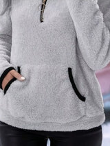 Cozy up in this full-size fleece quarter zip sweatshirt with pockets. Slightly stretchy and available in 11 colors and sizes Small–3XL for easy everyday style.