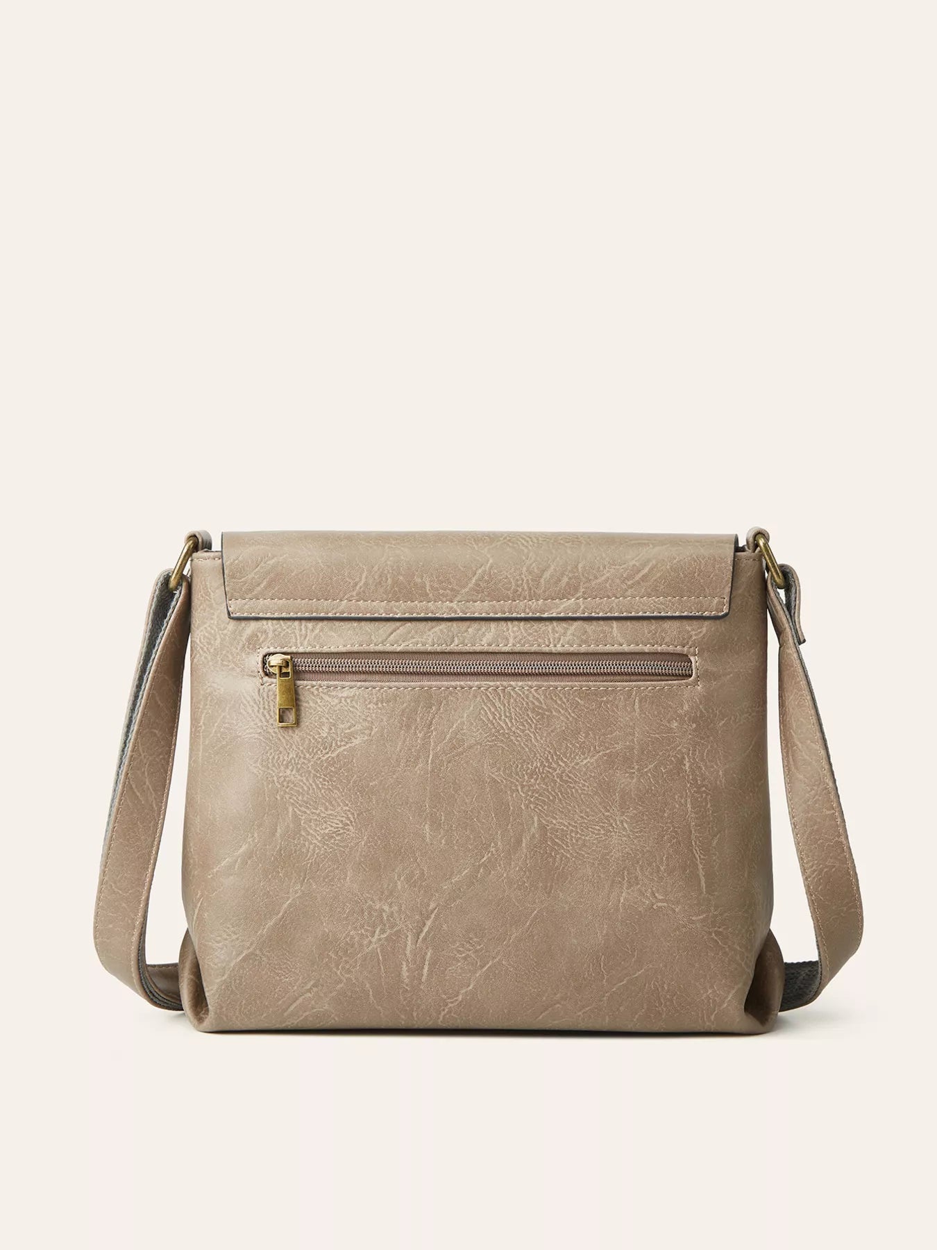 Light Gray vintage-style crossbody bag featuring a flap closure, decorative buckle detail, and adjustable shoulder strap.