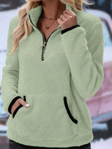 Cozy up in this full-size fleece quarter zip sweatshirt with pockets. Slightly stretchy and available in 11 colors and sizes Small–3XL for easy everyday style.