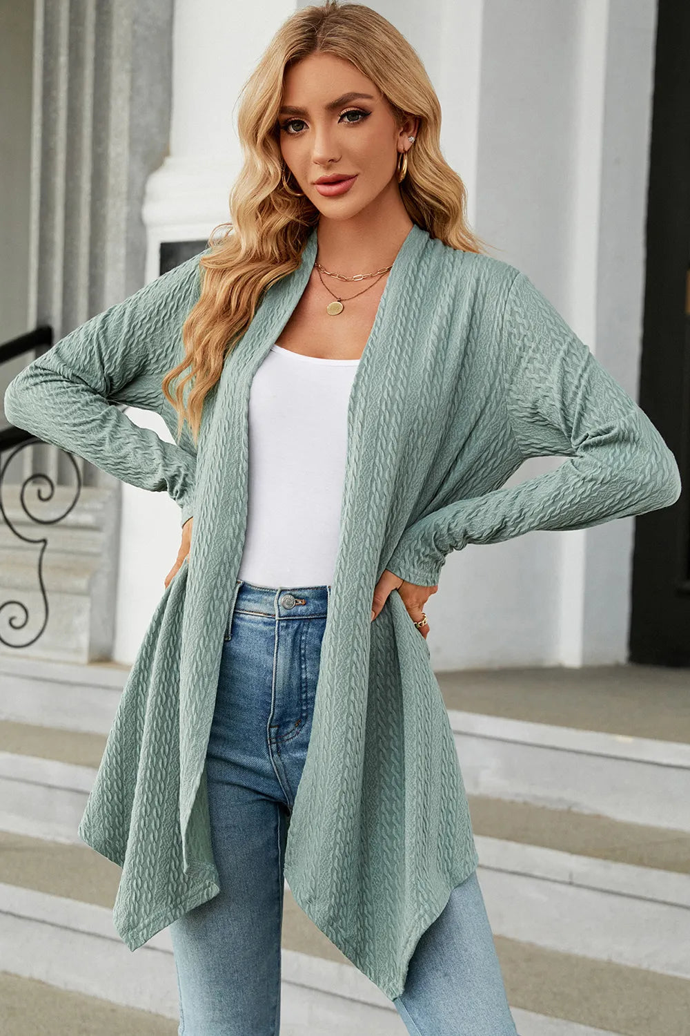 Women's Open Front Long Sleeve Cardigan in light green layered over a white tank and blue jeans, lightweight long cardigan for fall outfits, available in nine colors at Chic Mystik Boutique.