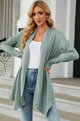 Women's Open Front Long Sleeve Cardigan in light green layered over a white tank and blue jeans, lightweight long cardigan for fall outfits, available in nine colors at Chic Mystik Boutique.
