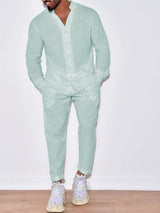 Men’s gum leaf button up long sleeve top and matching pants two-piece set styled with white sneakers, available in sizes Small–2XL.
