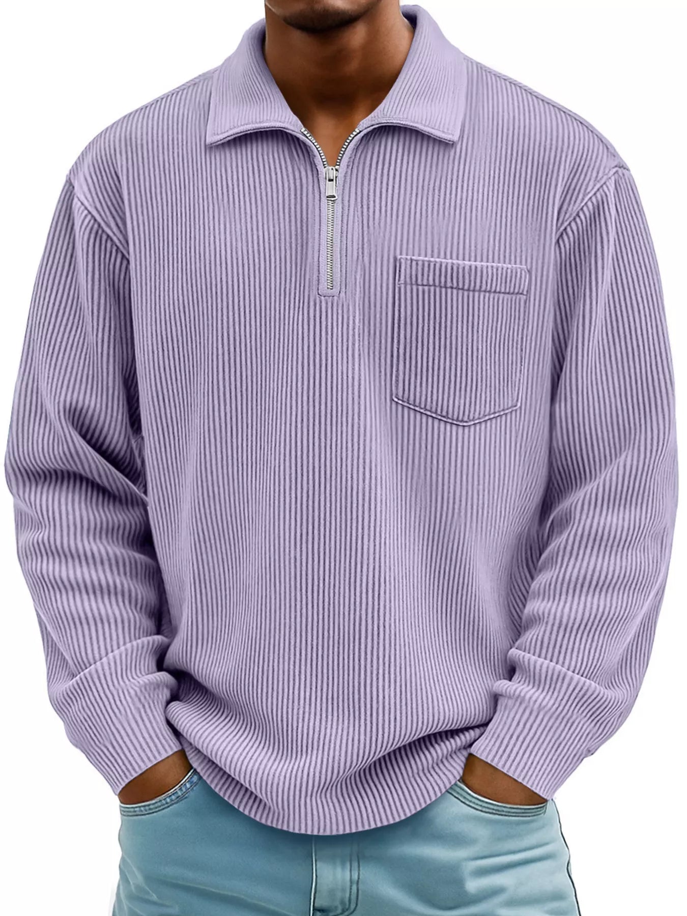 Man wearing a lavender ribbed corduroy half zip long sleeve casual top with collar and chest pocket.