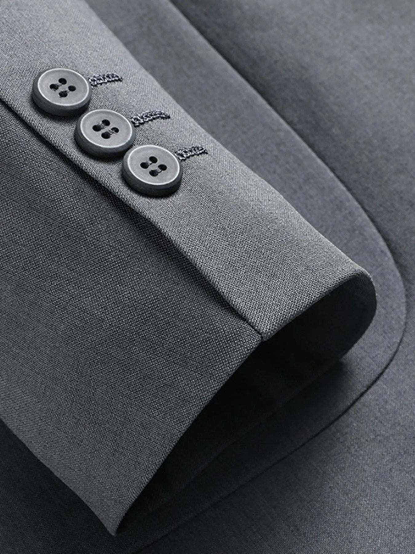 Men's gray lapel collar blazer with button-front closure and tailored fit for business casual, office wear, weddings, and formal occasions.