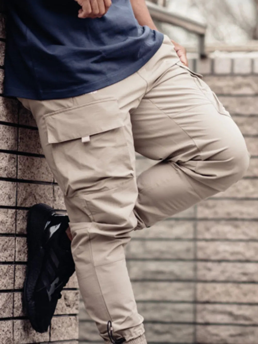 Men’s plus size mocha drawstring cargo pants with multiple utility pockets and gathered ankles