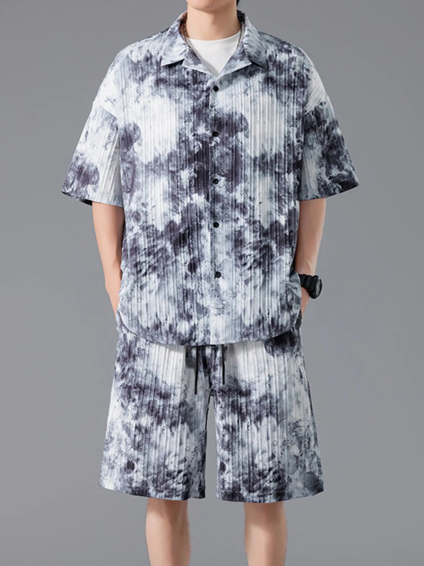 Men's plus size tie-dye two-piece outfit featuring a short sleeve button-up shirt and matching drawstring shorts in a dark navy and sage print.
