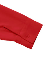 Close-up of a red shirt cuff with a button on a white background