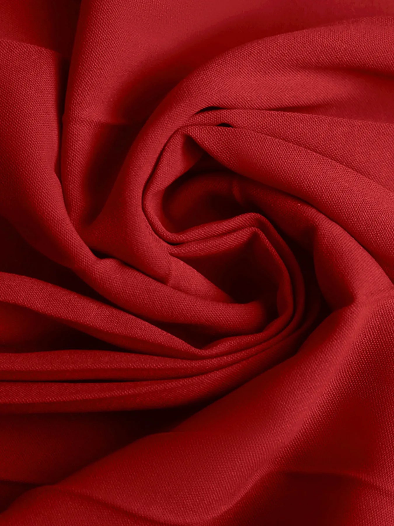 Close-up of red fabric with folds