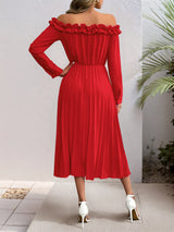 Red off-shoulder dress worn by a person on a neutral background showing back of the dress