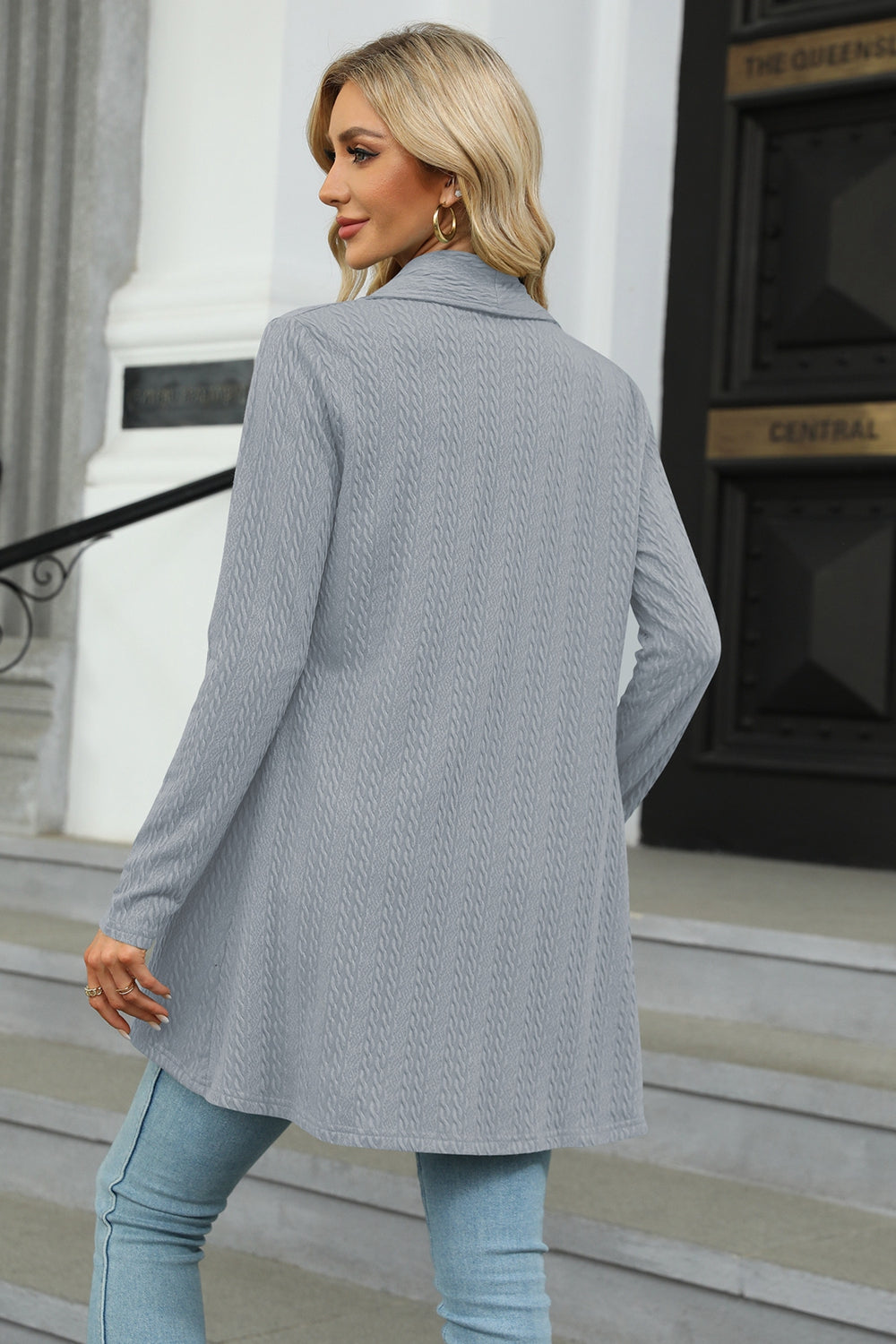 Women's cloudy blue colored open front long sleeve cardigan with a flattering high-low hem. Lightweight boutique cardigan perfect for layering over dresses, tanks, or jeans for effortless fall style.