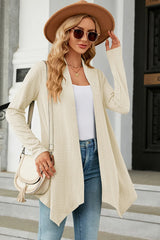 Women's Open Front Long Sleeve Cardigan in cream layered over a white tank and blue jeans, lightweight long cardigan for fall outfits, available in nine colors at Chic Mystik Boutique.