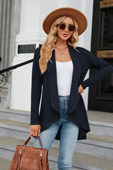 Women's dark navy colored open front long sleeve cardigan with a flattering high-low hem. Lightweight boutique cardigan perfect for layering over dresses, tanks, or jeans for effortless fall style.