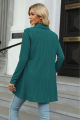 Women's deep teal colored open front long sleeve cardigan with a flattering high-low hem. Lightweight boutique cardigan perfect for layering over dresses, tanks, or jeans for effortless fall style.