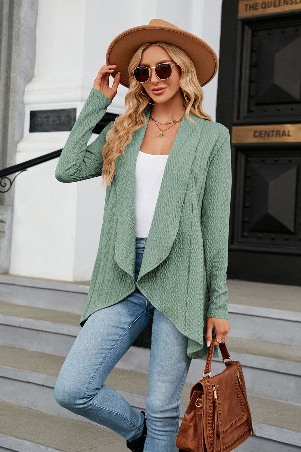 Women's sage-colored open front long sleeve cardigan with a flattering high-low hem. Lightweight boutique cardigan perfect for layering over dresses, tanks, or jeans for effortless fall style.