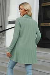 Women's sage-colored open front long sleeve cardigan with a flattering high-low hem. Lightweight boutique cardigan perfect for layering over dresses, tanks, or jeans for effortless fall style.