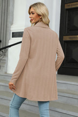 Women's tan colored open front long sleeve cardigan with a flattering high-low hem. Lightweight boutique cardigan perfect for layering over dresses, tanks, or jeans for effortless fall style.
